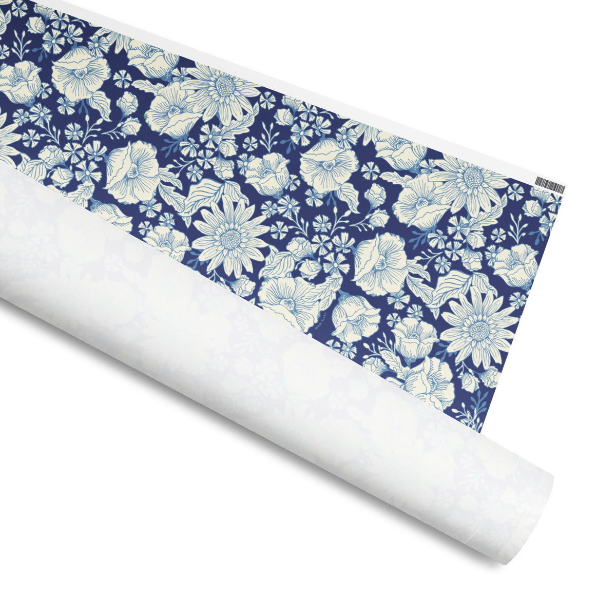 Jardin gift wrap, cream and pale blue chinoiserie peonies, sunflowers and dahlias on navy, 30 by 36 inch matte paper, shown partly rolled – Kate Spain design