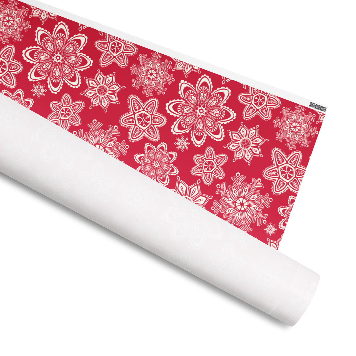 Snowy gift wrap, large ornate cream snowflakes on crimson, 30 by 72 inch matte paper, shown partly rolled – Kate Spain design